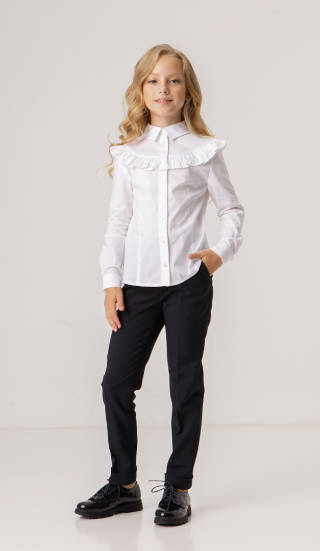 Фото bluzka-belaa-s-rusej-dla-devocki-01 товару Блузка біла з рюшею для дівчинки0