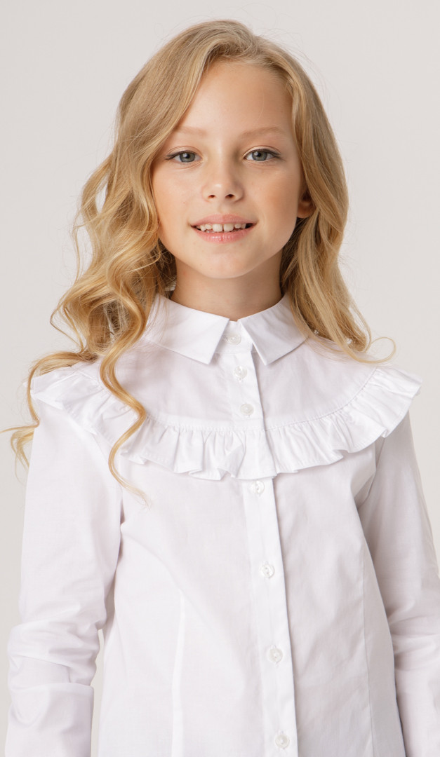 Фото bluzka-belaa-s-rusej-dla-devocki-03 товару Блузка біла з рюшею для дівчинки0
