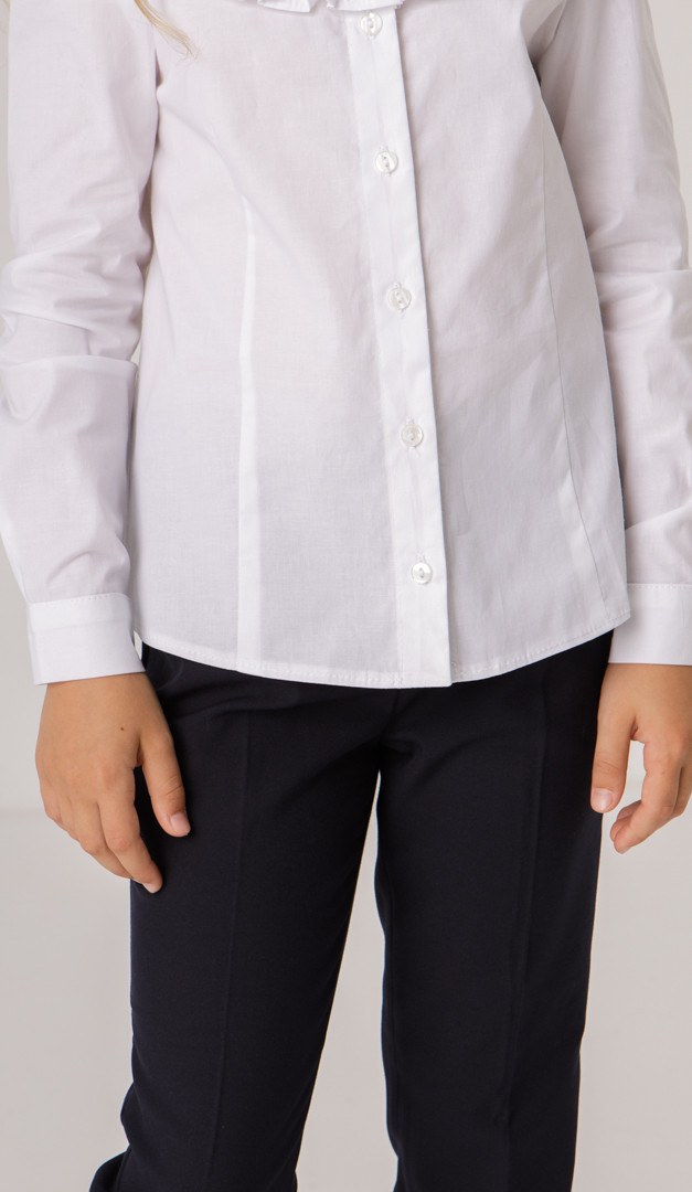 Фото bluzka-belaa-s-rusej-dla-devocki-04 товару Блузка біла з рюшею для дівчинки0