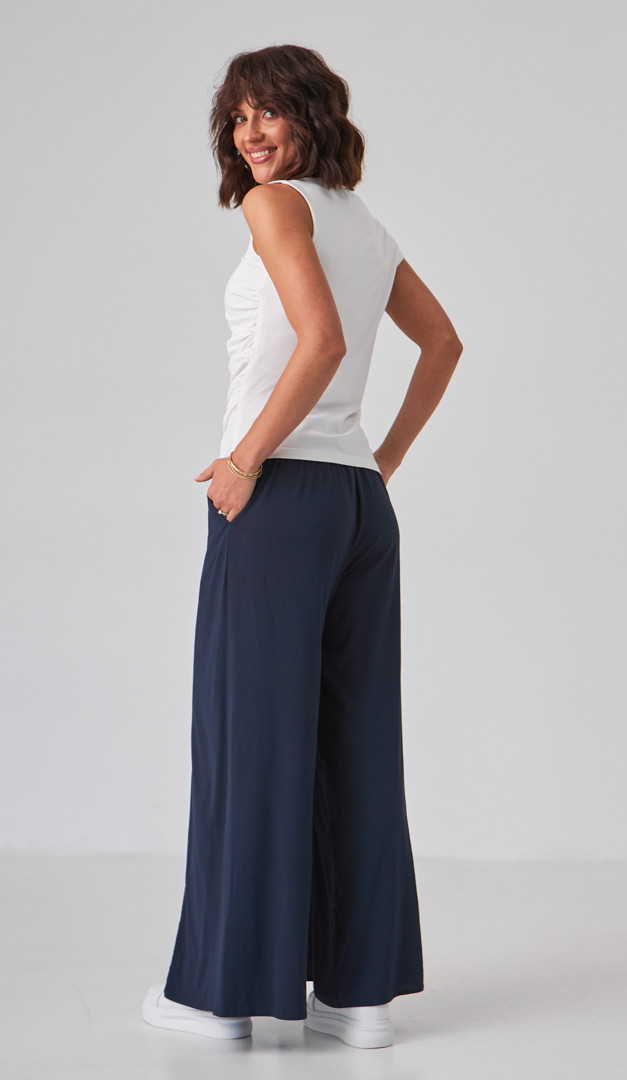 Фото top-zenskij-trikotaznyj-s-drapirovkoj-molocnyj-04 товару Топ жіночий трикотажний з драпіровкою молочний0